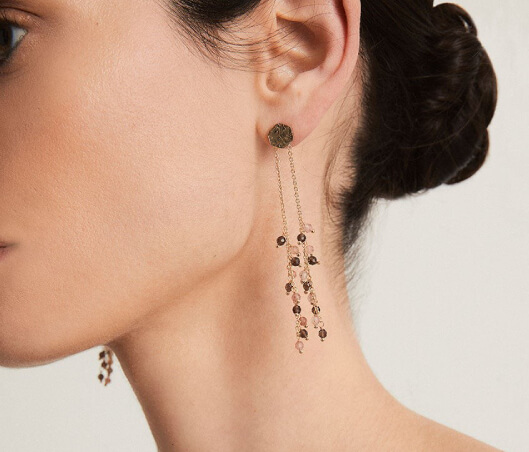 long earrings with stones and gold